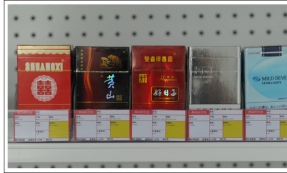 香烟货柜的整理变的井然有序   推烟器功不可没
